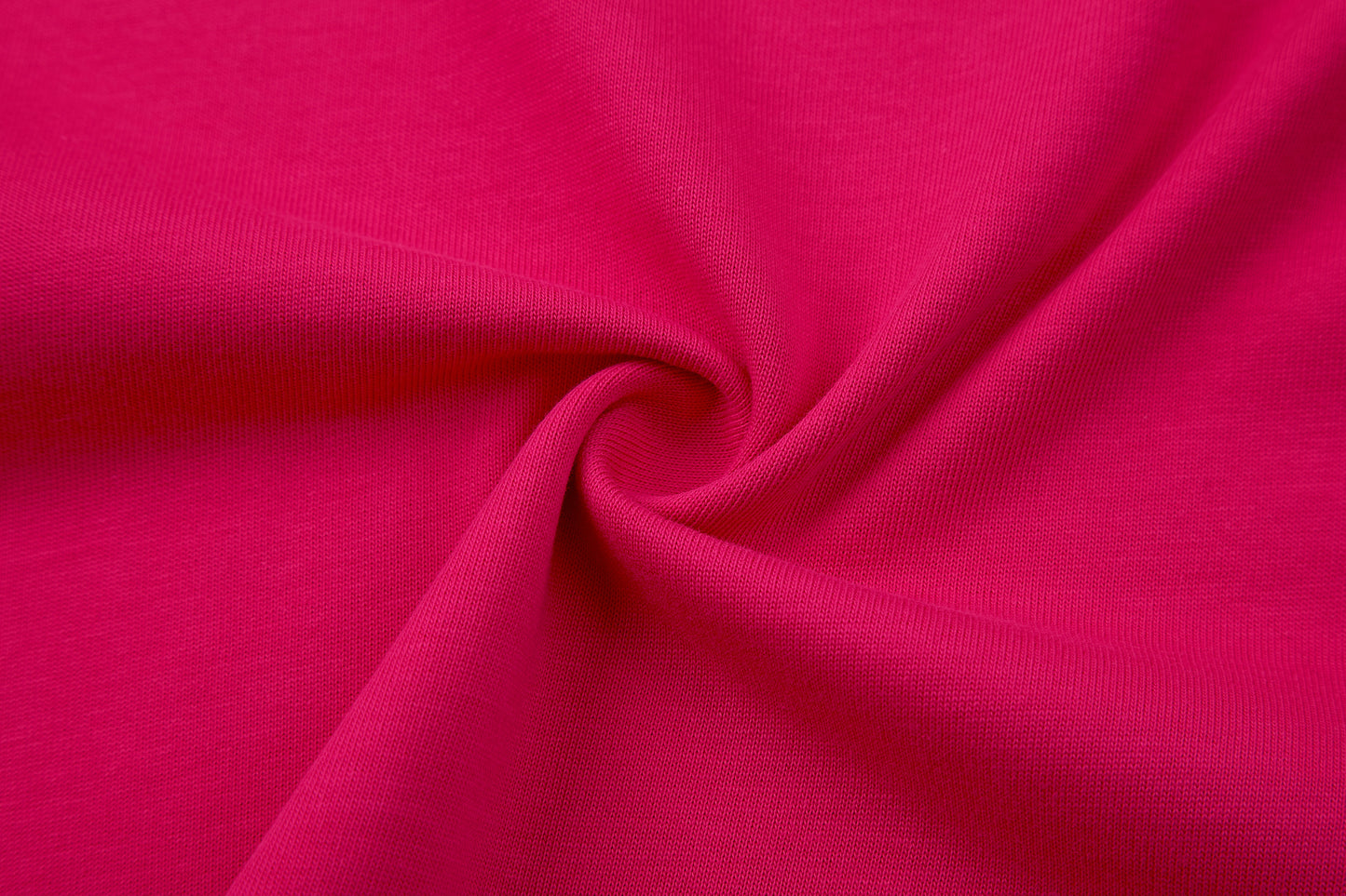 Close-up of pink fabric with folds