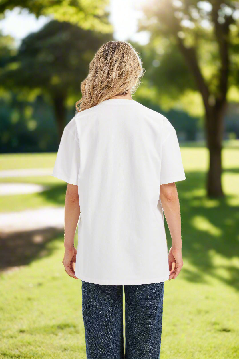 Back of a woman in a white tee