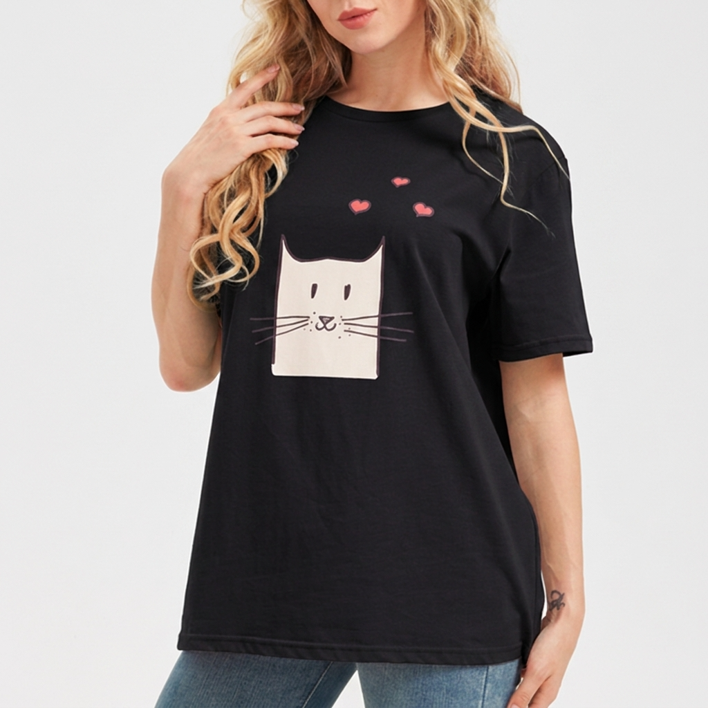 Woman wearing a black t shirt with a cat design